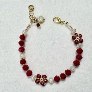 red and  gold Bracelet with flashy cream beads perfect for Valentines Day!